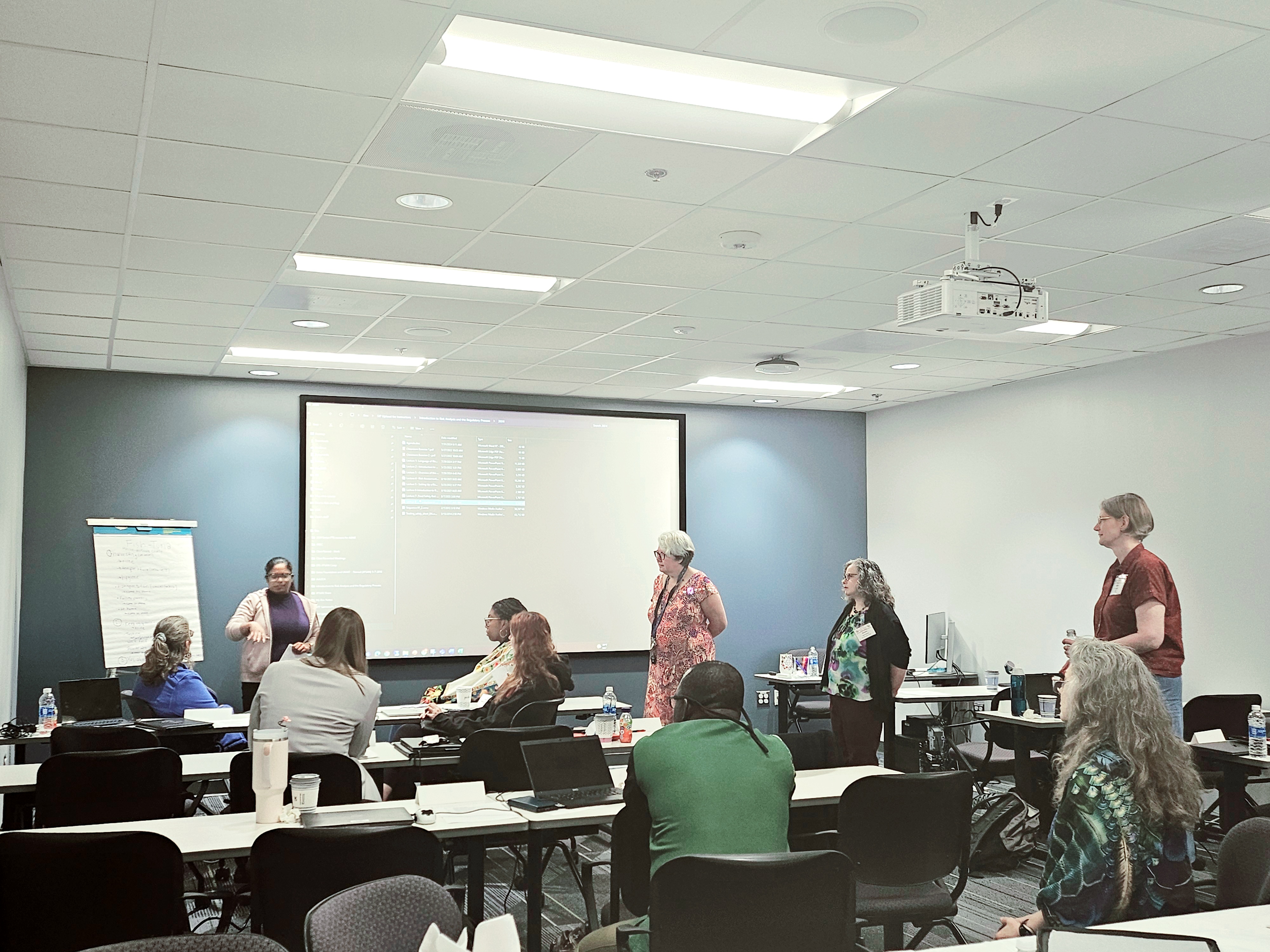 Participants view a group presentation.