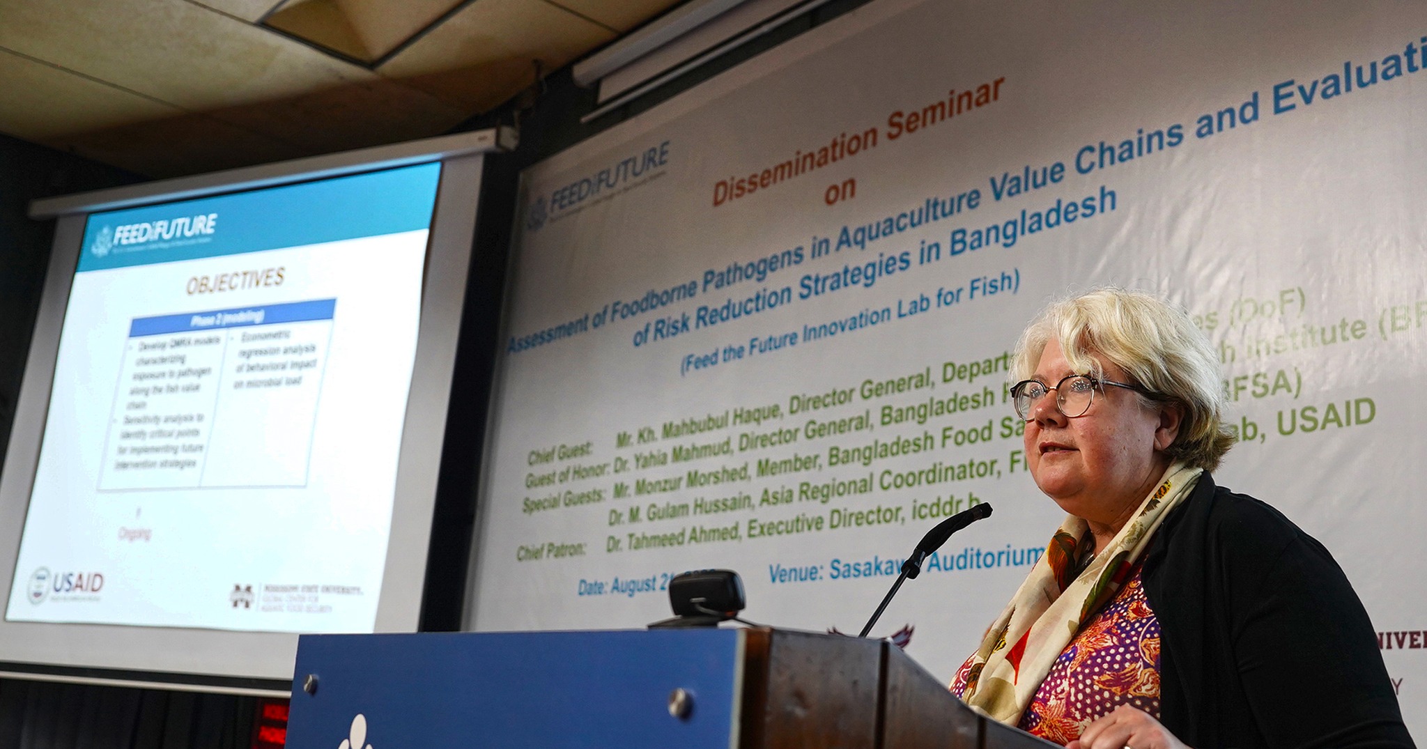 Dr. Clare Narrod making a presentation in Bangladesh.